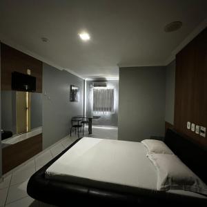 Postel nebo postele na pokoji v ubytování Hotel Clima