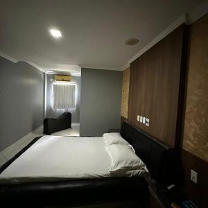 Postel nebo postele na pokoji v ubytování Hotel Clima