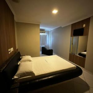 Postel nebo postele na pokoji v ubytování Hotel Clima