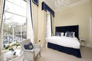 A bed or beds in a room at Destiny Scotland - Rutland Residence 