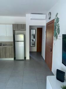 A kitchen or kitchenette at Apartment in Estrella, Dominicus-Bayahibe