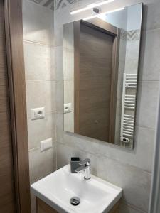 a bathroom with a sink and a mirror at Cà di GIACO in Moneglia +60 photos