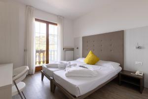 Postel nebo postele na pokoji v ubytování Park Hotel Val Di Monte ***S + 37 fotografií