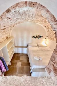 Cama o camas de una habitación en Dimora Luglio 1651