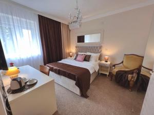 Voodi või voodid majutusasutuse International Inn toas