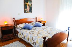 Voodi või voodid majutusasutuse Rooms Rajič toas