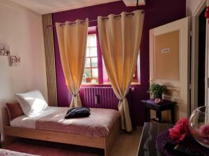 Postel nebo postele na pokoji v ubytování Chez Martine et Laurent