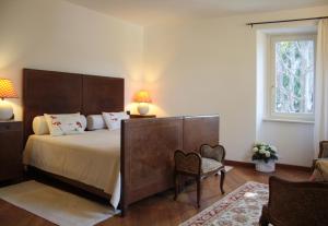 Cama ou camas em um quarto em Antico Glicine B&B