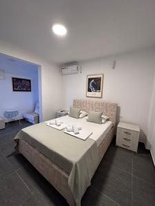 Postel nebo postele na pokoji v ubytování Hotel MonteNino