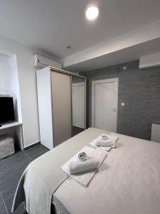 Postel nebo postele na pokoji v ubytování Hotel MonteNino