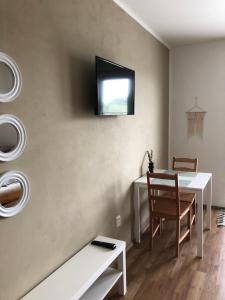 TV in/ali zabaviščno središče v nastanitvi Ubytování u Malinků