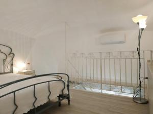 Postel nebo postele na pokoji v ubytování La Sorgente B&B