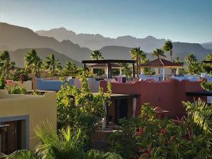 a view of a resort with mountains in the background at Casa Sierra by Casago in Loreto