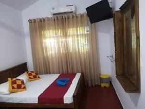 Кровать или кровати в номере Night Jusmine Holiday Home