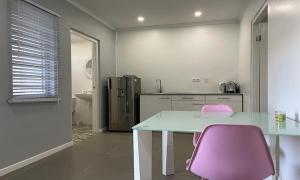 A kitchen or kitchenette at Apartment Curacao