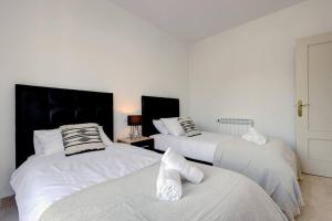 Posteľ alebo postele v izbe v ubytovaní Stunning Duplex 5 minutes from Puerto Banús