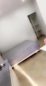 Voodi või voodid majutusasutuse Apartment Curacao toas