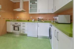 Kuchyň nebo kuchyňský kout v ubytování Apartamento Cortadura Playa