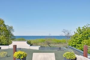 a view of the ocean from the balcony of a house at Dom & House - Apartamenty Nautilus Jelitkowo 50 metrów od plaży in Gdańsk