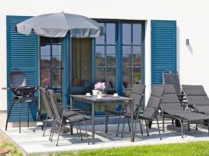 Siseõu või muu väliala majutusasutuses Reetland am Meer - Luxus Reetdachvilla mit 3 Schlafzimmern, Sauna und Kamin F22