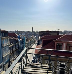 a view of a city from a balcony at Porto Cinema Apartments in Porto
