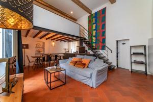 Posedenie v ubytovaní Loft calme à la Maison Carrée - Une Nuit à Nîmes