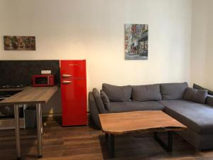 Kuchyň nebo kuchyňský kout v ubytování City Apartment