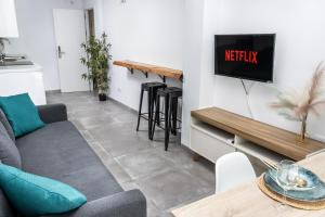 TV a/nebo společenská místnost v ubytování Lineros