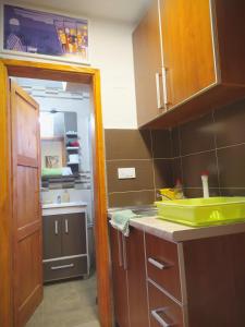 Kuchyň nebo kuchyňský kout v ubytování Summit Apartment