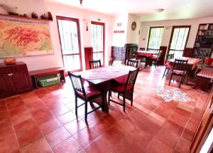 a dining room with a table and chairs at Chaty Tatra in Tatranska Strba