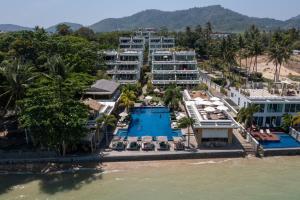 an aerial view of a resort with a swimming pool at Selina Serenity Rawai Phuket in Rawai Beach