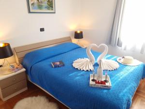 Łóżko lub łóżka w pokoju w obiekcie Apartments Medulin - Orijeta