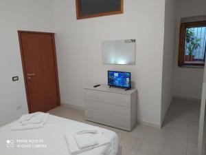 TV a/nebo společenská místnost v ubytování La casetta di Alessandro