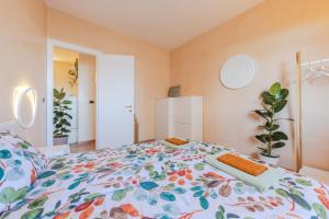 Rúm í herbergi á APARTMENTS GASSER - Apartment 3