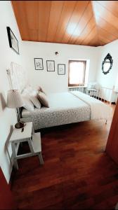 Cama o camas de una habitación en Aurora Appartamenti