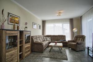 Posezení v ubytování modernes Ferienhaus mit eigenem Garten und Terrasse - Ferienhaus Bauernrose