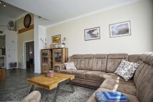 Posezení v ubytování modernes Ferienhaus mit eigenem Garten und Terrasse - Ferienhaus Bauernrose