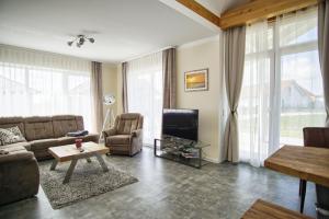 Posezení v ubytování modernes Ferienhaus mit eigenem Garten und Terrasse - Ferienhaus Bauernrose