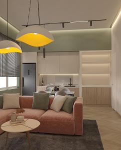 a living room with a couch and a kitchen at Salamina's apartments in Salamina