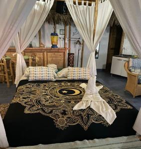 Postel nebo postele na pokoji v ubytování Bora Bora Bungalows
