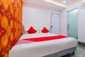 Katil atau katil-katil dalam bilik di OYO Hotel New Tech India