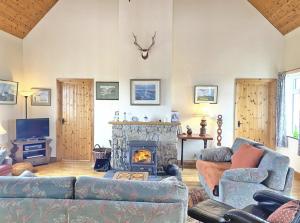 Posezení v ubytování Lands End Cottage - Connemara