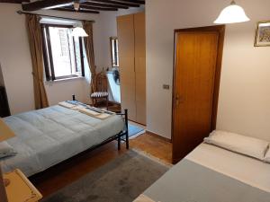 A bed or beds in a room at Casa in Umbria