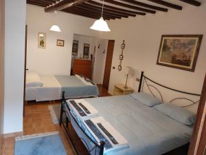 A bed or beds in a room at Casa in Umbria