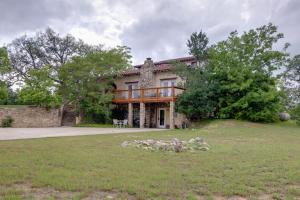 a large stone house with a large yard at San Marcos Apartment on 10 Acres about 6 Mi to TSU! in San Marcos