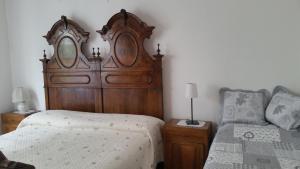 Ένα ή περισσότερα κρεβάτια σε δωμάτιο στο Apartment Iseo Lake