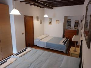 A bed or beds in a room at Casa in Umbria