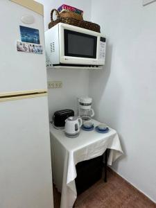 Cuisine ou kitchenette dans l'établissement Excelente ubicación en el corazón de San Fdo.