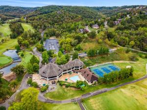 an aerial view of an estate with a swimming pool at StoneBridge Village Resort in Reeds Spring