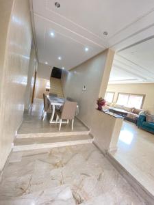 Μια τηλεόραση ή/και κέντρο ψυχαγωγίας στο Villa AGADIR pas cher +14 φωτογραφίες